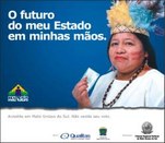 Anúncio da campanha - 3ª Etapa - "O Futuro do Meu Estado". Mulher indígena segura um título de e...